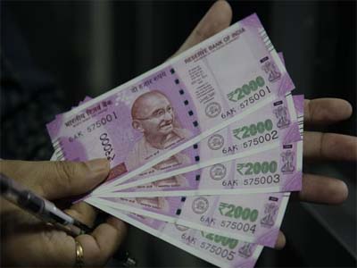 Rupee zooms to one week high of 64.44 against US dollar