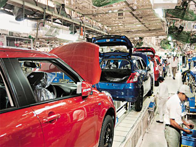 Maruti Suzuki, Mahindra gain on strong car sales
