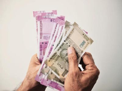 Rupee closes lower against US dollar