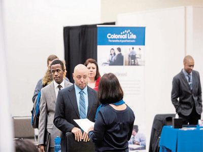 US job growth slows, but wages rebound strongly