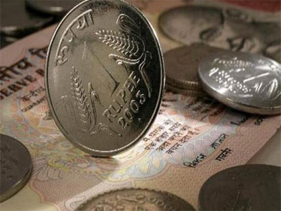 Rupee gains by 25 paise against US dollar in early trade