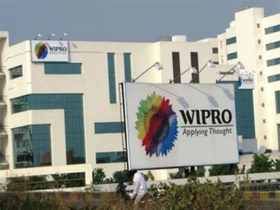 Wipro gains on buyback plans