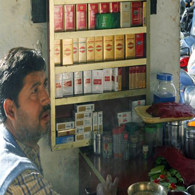 ITC tries short cigarettes as taxes hit demand