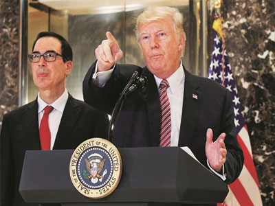 Trump's business councils are disbanded after CEOs quit in protest