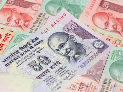 Rupee continues to slide, opens 22 paise lower against US dollar