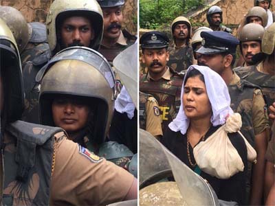 Sabarimala row: Amid strong protests, two women begin climbing hill to visit Lord Ayyappa temple
