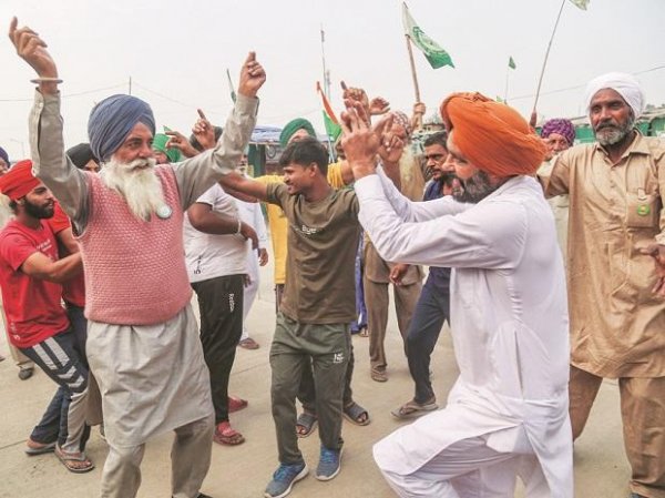 Repeal of farm laws: Ghazipur border erupts with joy and jalebis
