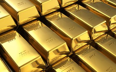 Gold weakens on muted demand, global cues