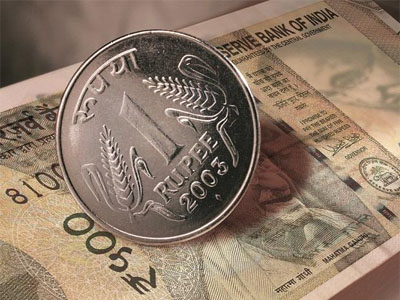 Rupee opens higher at 69.49 per dollar against the previous close of 70.22