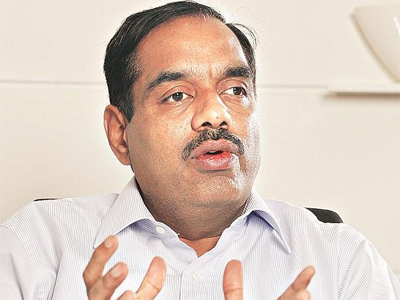 Balakrishnan pats Nilekani for fixing a 'reasonable salary' for Infosys CEO