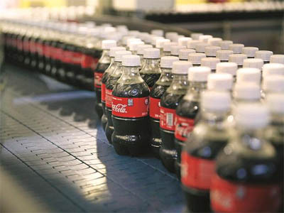 Coca-Cola moves out of bottling ops in North India, to divest three plants