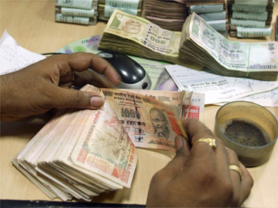 Rupee down 11 paise against dollar in early trade
