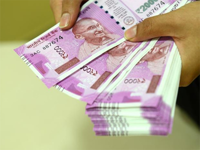 Rupee closes stronger against US dollar