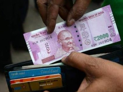 Rupee nears 64 level against US dollar, falls 14 paise