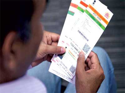 Aadhaar to be mandatory for income tax returns, getting PAN