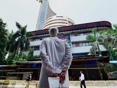 Sensex ends 541 points on global markets sell-off, Nifty settles at 7,812