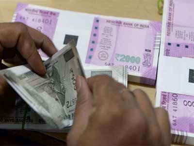 Rupee closes marginally higher against US dollar