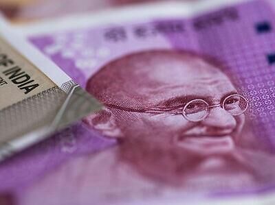 Rupee surges 7 paise to 74.26 against US dollar in early trade