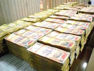 Rupee breaches 64 mark as importers buy dollars