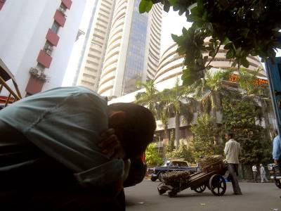 Sensex slumps by almost 300 points, Nifty hits one-month low