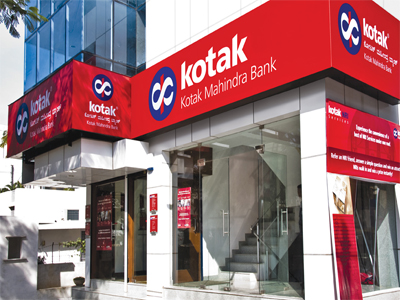 Kotak Mahindra Bank gains on heavy volumes