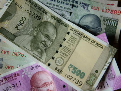 Rupee hits two-week high as oil prices, geopolitical tension ease