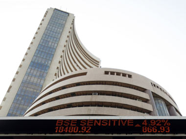 Markets open flat; Tata Motors up over 1%