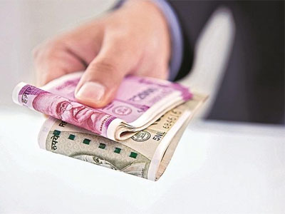 Rupee extends gains, opens 18 paise higher at 69.67