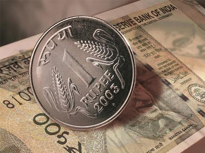 Rupee opens marginally higher against US dollar amid dip in oil prices