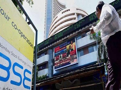 After closing on record high, Sensex opens flat over negative global cues