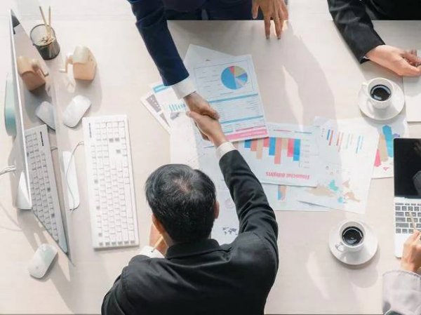 Global M&A volumes hit record high in 2021, breach $5 trn for first time