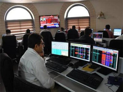 Sensex slips 137 points in volatile trade
