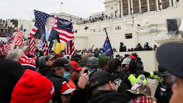Pro-Trump protesters storm US Capitol as Congress certifies Biden's win; woman shot dead