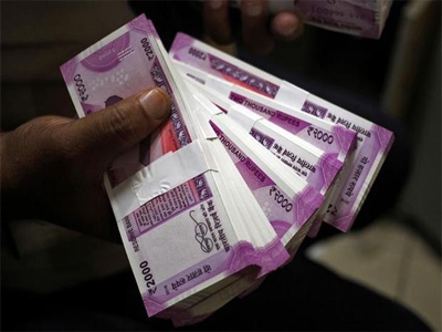Rupee closes lower against US dollar